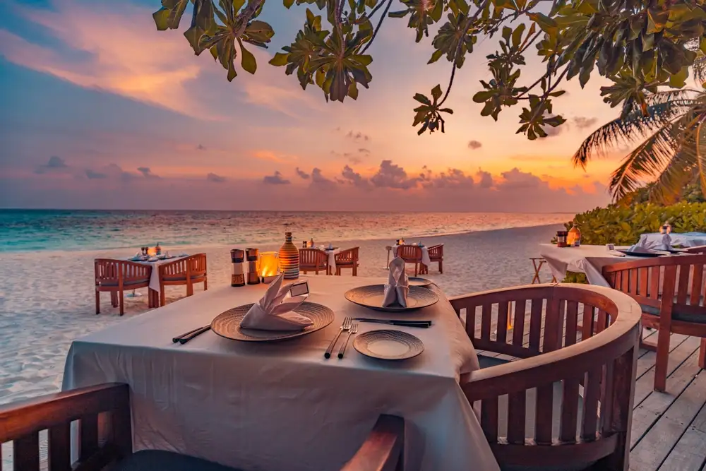 Restaurant reservations systems like Yelp Guest Manager can allow diners to book a high sought after table with an ocean view as shown in this image.