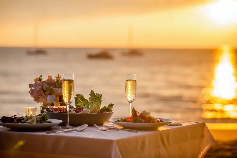 In-demand dining experiences are often booked through OpenTable, a leading online restaurant reservation system. This image shows a a table with an ocean view that was reserved through an online restaurant reservation system.